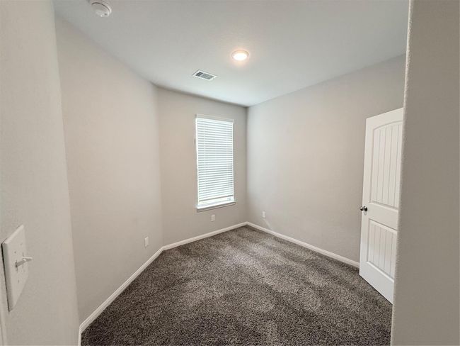 14501 SUGAR PINES DR - Secondary Bedroom - three bedrooms and full bath at the front of the home | Image 33