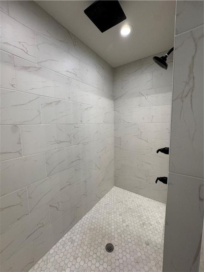 Bathroom with tiled shower and recessed lighting | Image 37