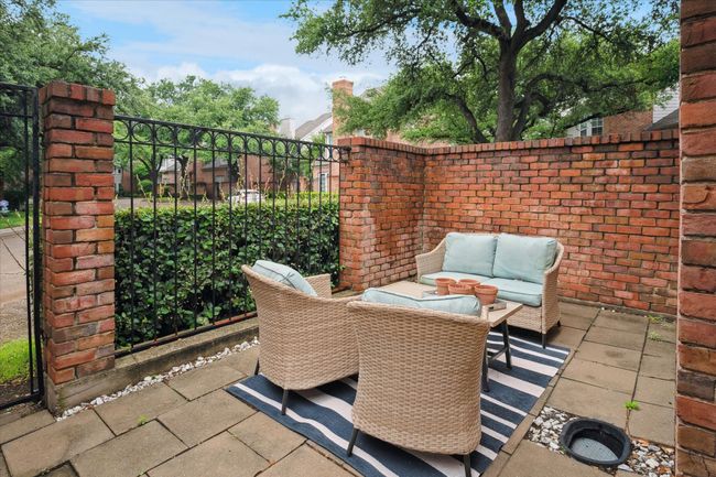 Charming courtyard perfect for morning coffee or entertaining friends! | Image 13