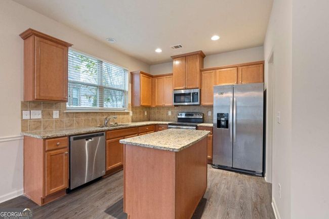 3879 Brockenhurst Dr, Townhouse with 4 bedrooms, 3 bathrooms and 2 parking in Buford GA | Image 6