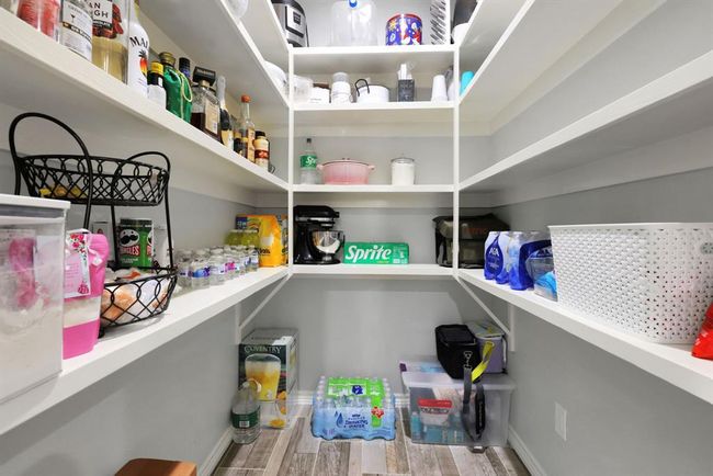 An oversized pantry offers abundant storage—perfect for the chef in the family and all your culinary essentials. | Image 22