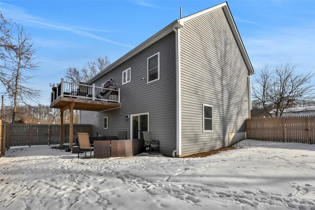 Snow covered house featuring a balcony and a hot tub | Image 34