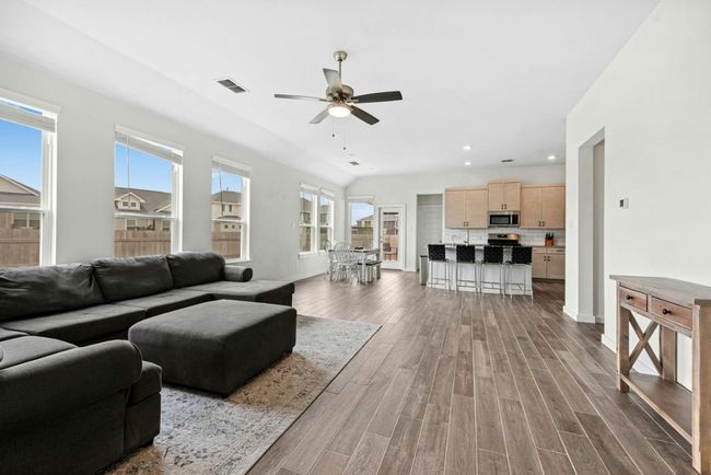 Open-concept living/dining/kitchen | Image 7