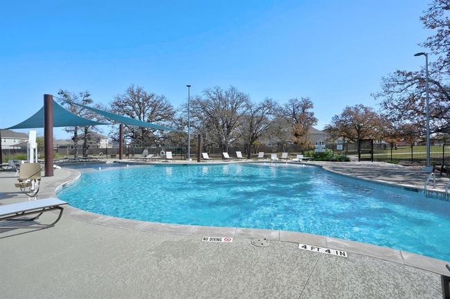 Community pool featuring a patio area | Image 34