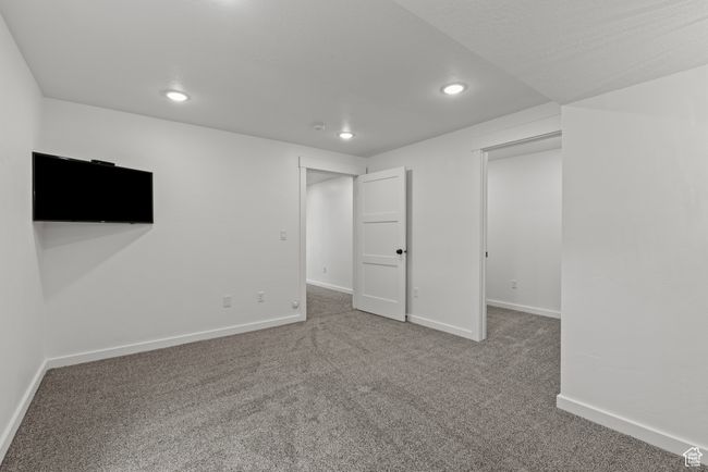 Basement featuring recessed lighting, carpet, and baseboards | Image 36