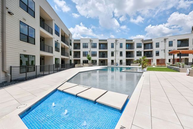 Community pool featuring a patio area | Image 29