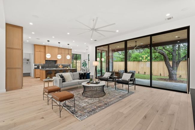 The open concept living area is great for entertaining. | Image 8