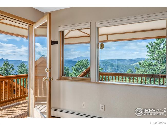 access to the deck from the living room | Image 7