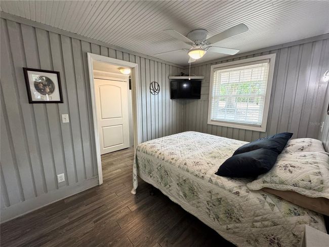 Primary bedroom off the kitchen. Built in closet and has a full primary bathroom with laundry closet | Image 15