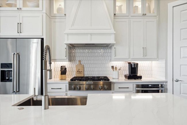 CHEERS to the wine fridge in the last cabinet, standing proudly between the kitchen and living area, always ready to chill and delight! | Image 12