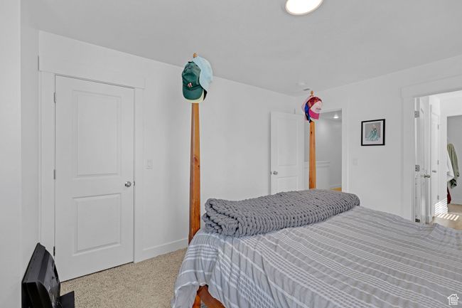 Bedroom featuring baseboards | Image 13