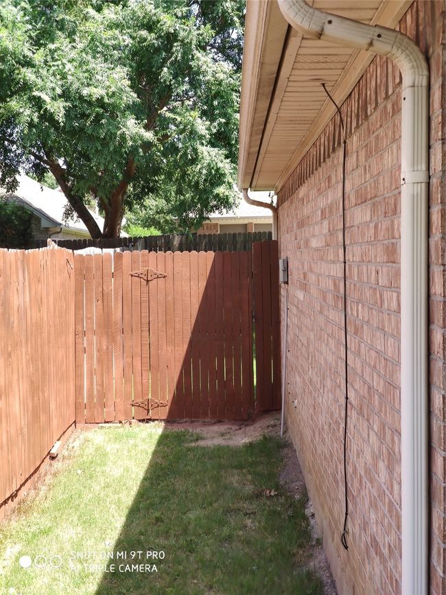 View of yard featuring fence | Image 7