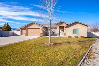 233 Javan Court, House other with 3 bedrooms, 2 bathrooms and null parking in Fruita CO | Image 1