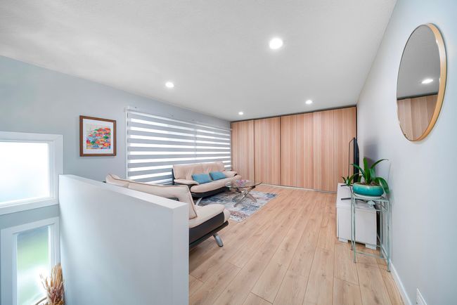 Sitting room with recessed lighting and light wood-type flooring | Image 8