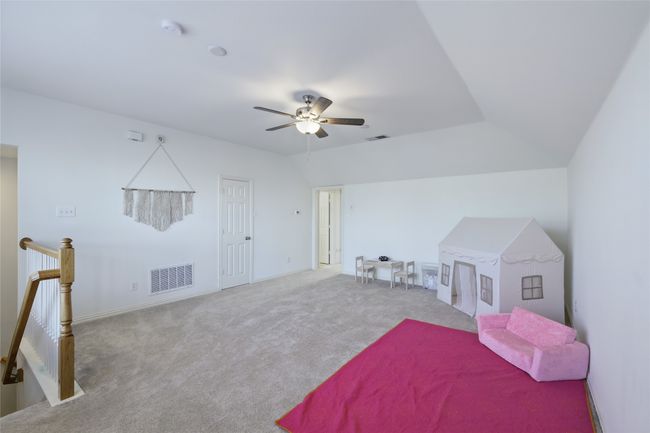 Game Room on Level 2 leads to a full bonus guest bedroom and full bathroom on level 2 | Image 23