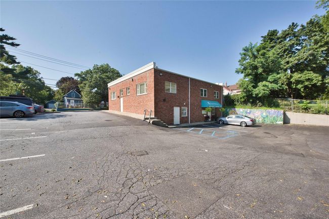 View of uncovered parking lot | Image 13