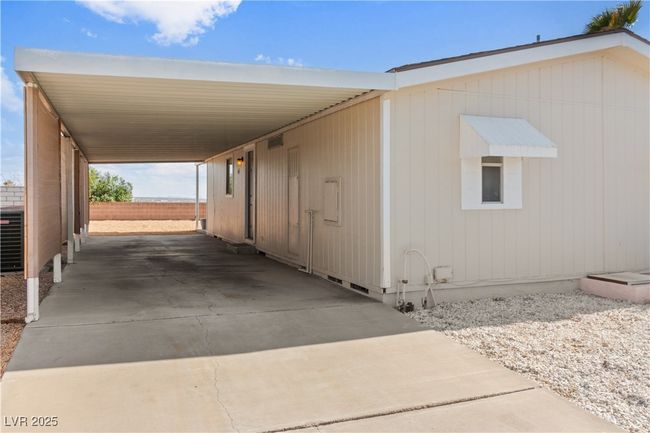 Carport on left side of Home. | Image 30