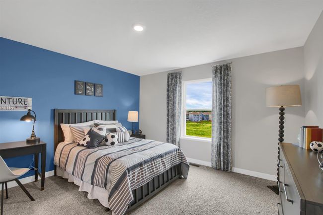 The additional upper level bedrooms are spacious and have their own walk in closets! Model photos. Options and colors will vary. | Image 31