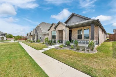 Craftsman inspired home featuring a front lawn | Image 2