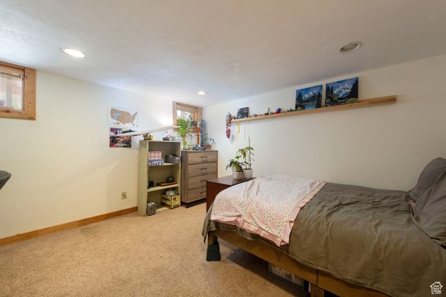 Bedroom featuring light carpet and recessed lighting | Image 20