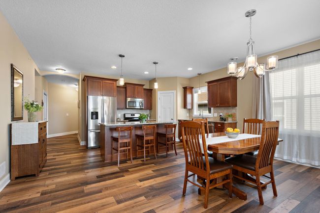 Gorgeous Custom Cherry Kitchen cabinets with granite countertops, large center island, breakfast bar, recessed and pendant lighting, walk-in pantry, tile backsplash, soft-close drawers & doors, gas range and stainless steel appliances - WOW! | Image 4