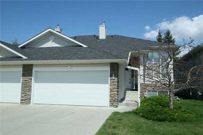 35 Wentworth Gdns Sw, Home with 2 bedrooms, 2 bathrooms and 4 parking in Calgary AB | Image 1