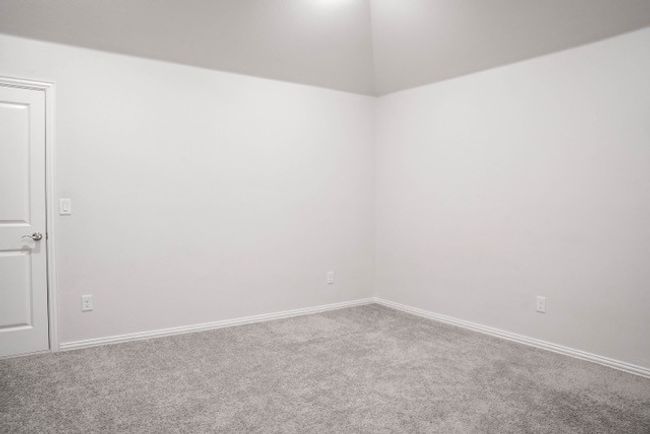 Empty room featuring carpet and baseboards | Image 23