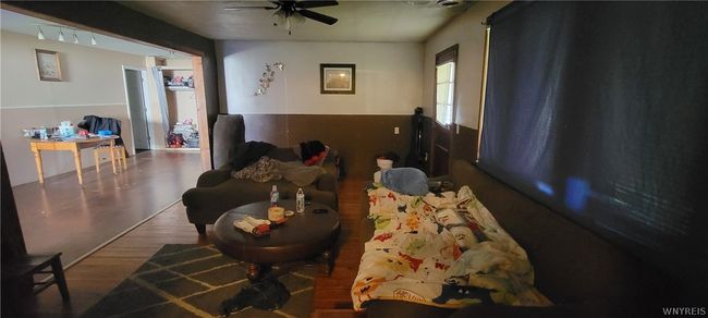 Living room looking into dining room | Image 4