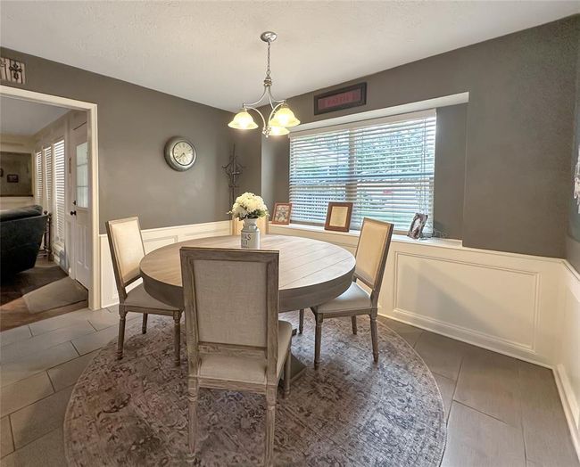Positioned to the back end of the layout, this room offers added privacy and versatility. | Image 10
