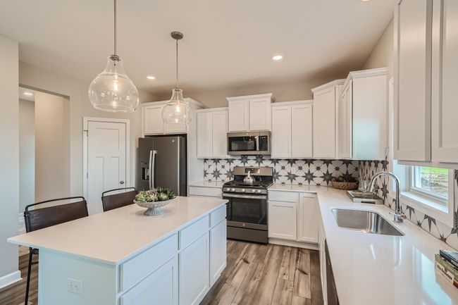 Photo is of the model. Imagine entertaining your friends and family in this functional, timeless design for years to come! | Image 4