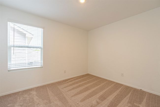 Empty room with light carpet and baseboards | Image 19