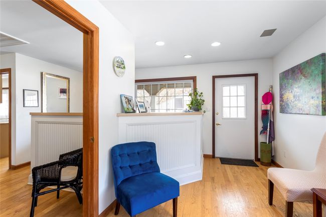 Foyer featuring light wood finished floors, recessed lighting, and baseboards | Image 17