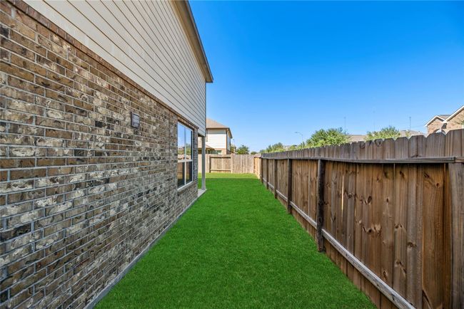 Summertime will be much sweeter with a large fully fenced-in backyard. | Image 39
