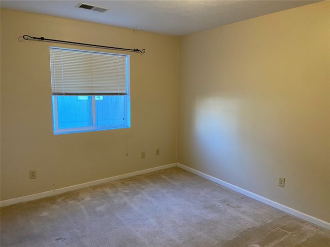Carpeted empty room with baseboards | Image 38