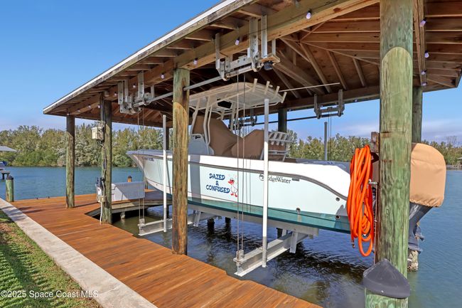 1061 Bali Rd, House other with 4 bedrooms, 2 bathrooms and null parking in Cocoa Beach FL | Image 57