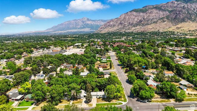 Aerial view of residential area with a mountain backdrop | Image 32