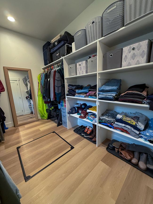 Spacious primary walk-in closet | Image 19