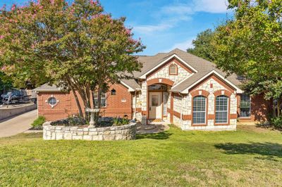 View of front of home featuring a front lawn | Image 1