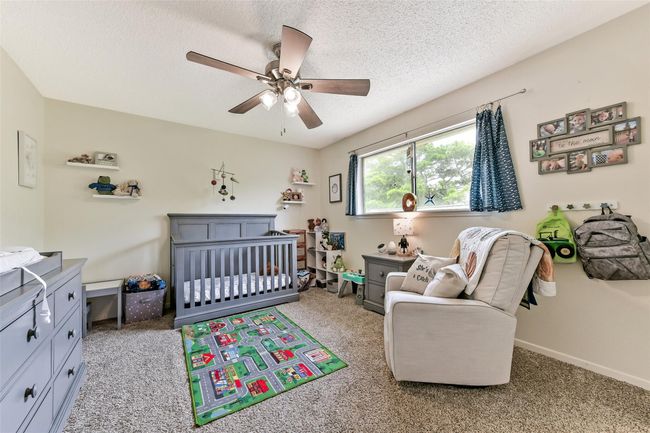 This bedroom is bright and airy with plenty of closet space. | Image 27