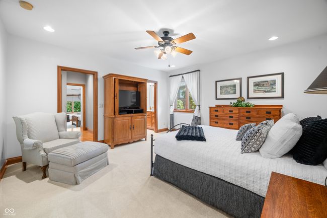 bedroom featuring ceiling fan, light carpet, recessed lighting, and baseboards | Image 93