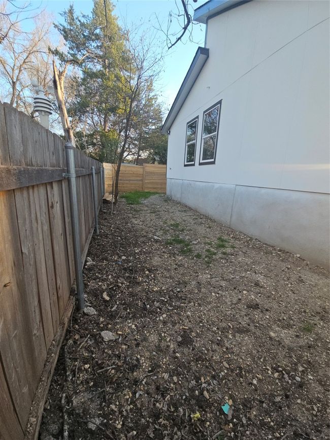 View of yard featuring fence | Image 25