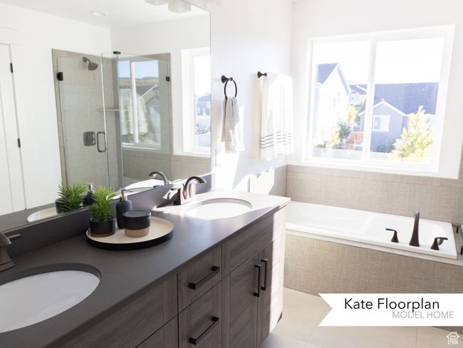 Full bathroom with a sink, a wealth of natural light, and a shower stall | Image 13