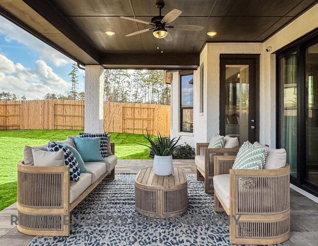 View of patio / terrace featuring an outdoor living space and ceiling fan | Image 36