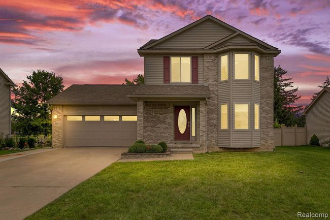 8863 Railwood Drive, Home with 3 bedrooms, 2 bathrooms and null parking in Berlin Twp MI | Image 2