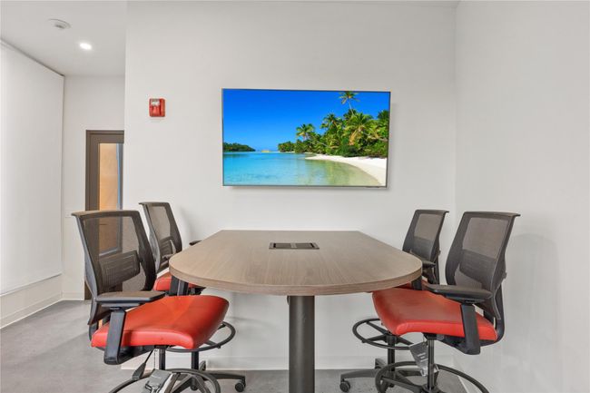 Office area featuring baseboards, recessed lighting, and concrete floors | Image 10