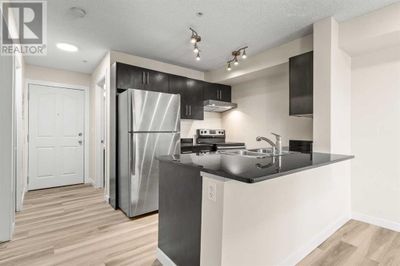 411 - 355 Taralake Way Ne, Condo with 2 bedrooms, 1 bathrooms and 1 parking in Calgary AB | Image 2