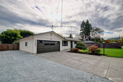 Front view on left side of driveway with RV parking area. | Image 3