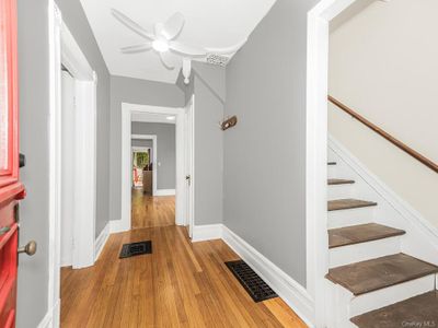 Hallway featuring light wood-type flooring | Image 3