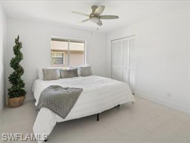 Bedroom with a closet and ceiling fan | Image 19