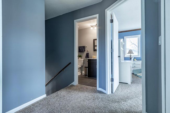 Upper level entry way facing the bath and primary bedroom.jpg | Image 29